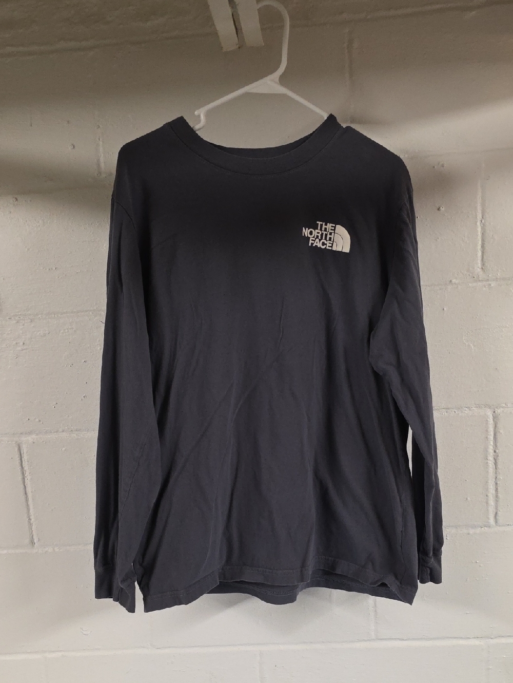 The North Face Men's Long Sleeve Tee in Black with White Logo